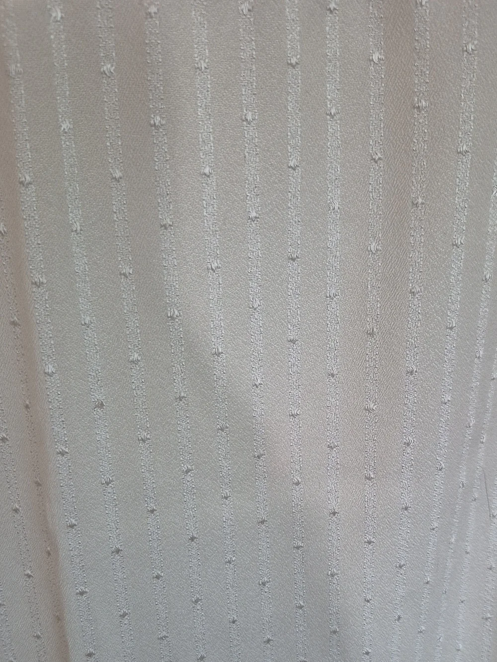 Three Cream Tasseled Curtain Panels